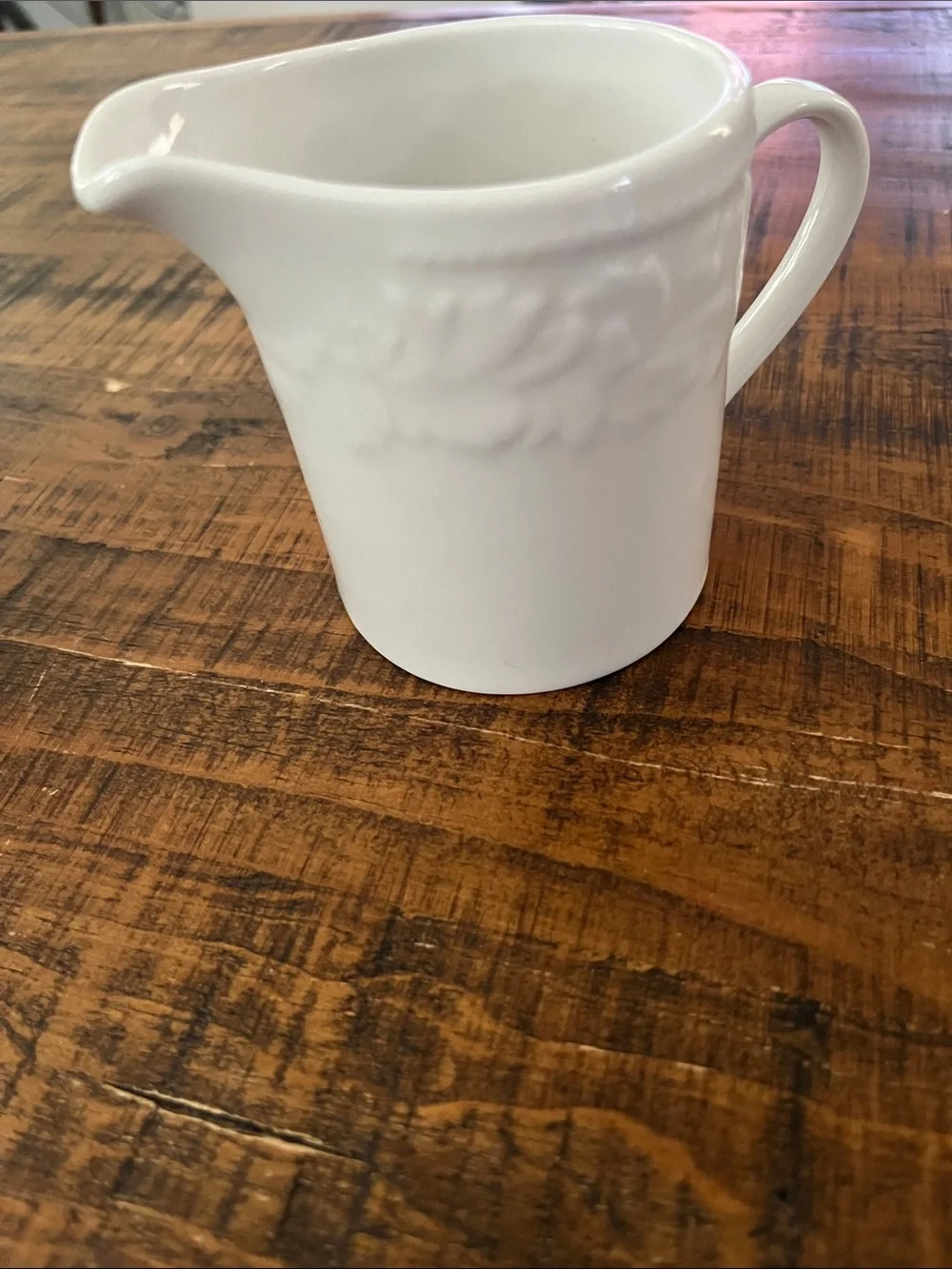 Classic White Ceramic Creamer with Embossed Detail